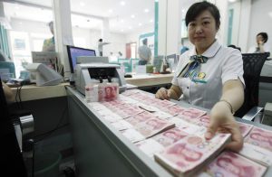 Bank teller counts renminbis