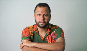 Henirque Vieira looks at the camera for a portrait on Brazil's Black Conscience Day .