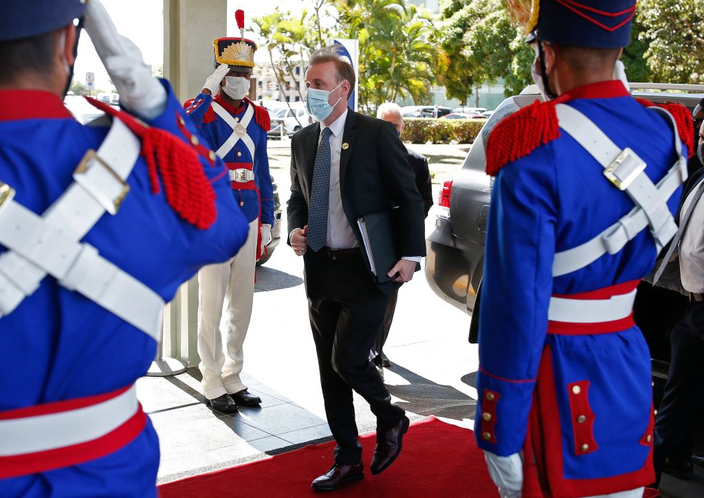 White House official Jake Sullivan greeted by Brazils ceremonial guard.