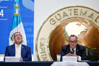 President Alejandro Giammattei and president-elect Bernardo Arévalo at a government transition event.