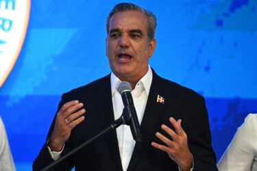 Dominican Republic President Luis Abinader speaks to supporters after the first results of the general elections. After cruising to reelection, Abinader now has choices to make.