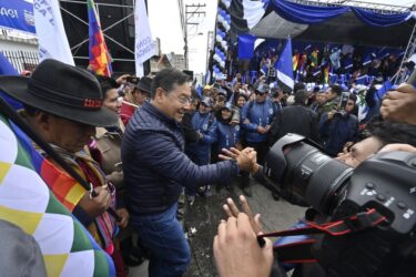 Bolivia's President Luis Arce greets supporters upon his arrival at the 10th congress of the Movement for Socialism (MAS) party in El Alto, Bolivia, on May 3, 2024.