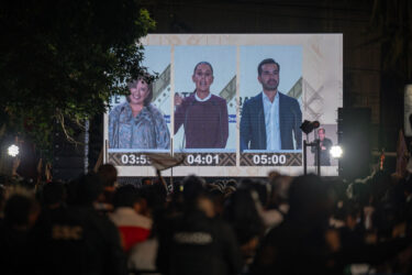 The public watches a presidential debate between Xochitl Galvez, Claudia Sheinbaum and Jorge Alvarez Maynez in Mexico City in April.