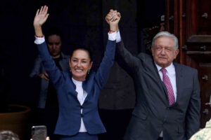 Dedazo: Mexico's President-elect Claudia Sheinbaum celebrates with President Andrés Manuel López Obrador at the National Palace in Mexico City in June.