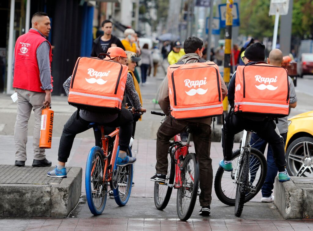 Venezuelan nationals make deliveries for Rappi in Bogotá in this file photo.