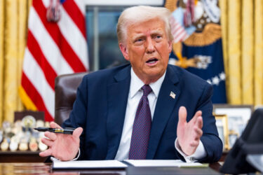 U.S. President Donald Trump speaks while signing executive orders on Jan. 20.