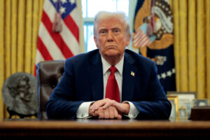 U.S. President Donald Trump talks to reporters at the White House on Jan. 30.