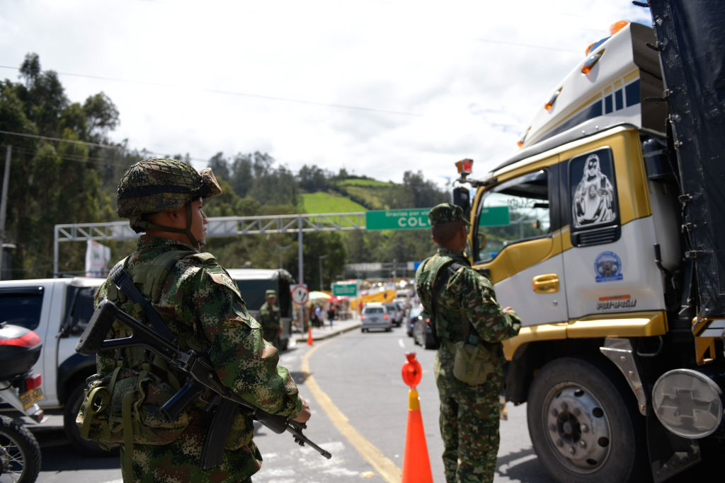 Colombia's national army guards the border Rumichaca bridge with Ecuador in January 2024. To Fight Organized Crime, Latin America Needs a Regional Security Force: Escalating violence is a cross-border crisis that demands collective action.