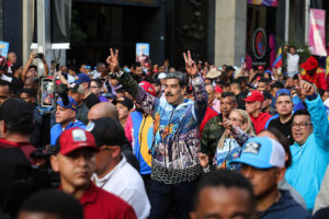 Venezuelan President Nicolas Maduro takes part with First Lady and candidate for the National Assembly, Cilia Flores, in a march marking the end of the electoral campaign on May 22, 2025 in Caracas, Venezuela. On May 25, Venezuelans will vote in the local elections for 285 members of the National Assembly, 24 governors, and 260 legislators to state legislative councils.