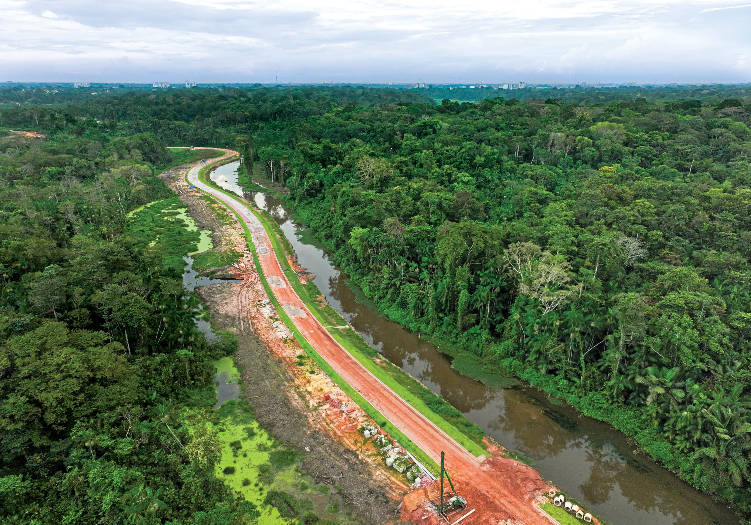 An unfinished bike path extends into the rainforest of Utinga State Park as work continues in May on infrastructure projects in Belém.
