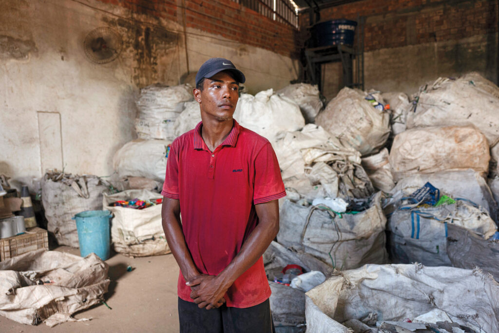 “Our street’s impassable, no asphalt, just mud. Cars slide off the road every day. Sometimes the school bus can’t even get through, and class gets canceled.” —Henrique Adriano, 21, a recyclable waste picker, works at the landfill on the outskirts of Belém.