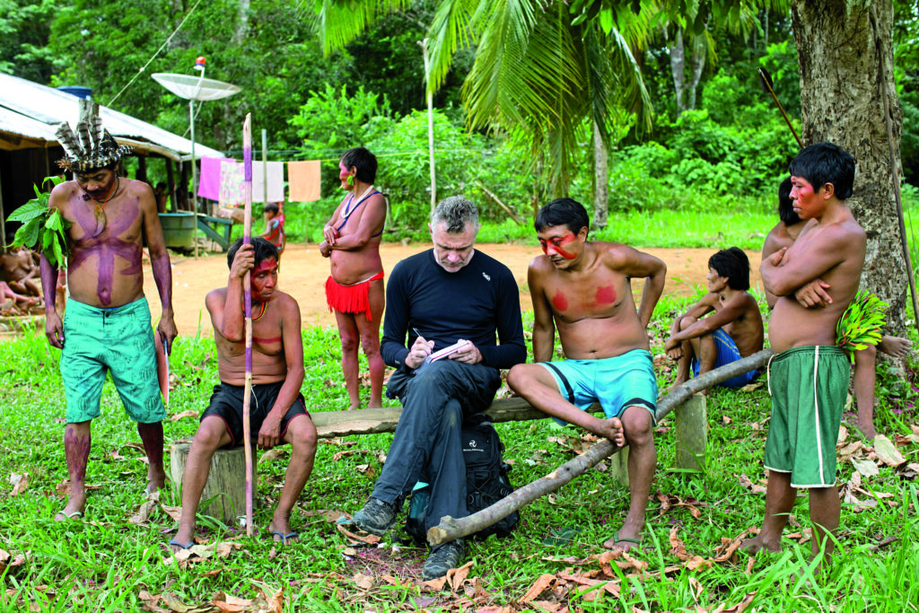 The British journalist Dom Phillips conducts interviews for his book during a reporting trip to the Amazon in 2019.
