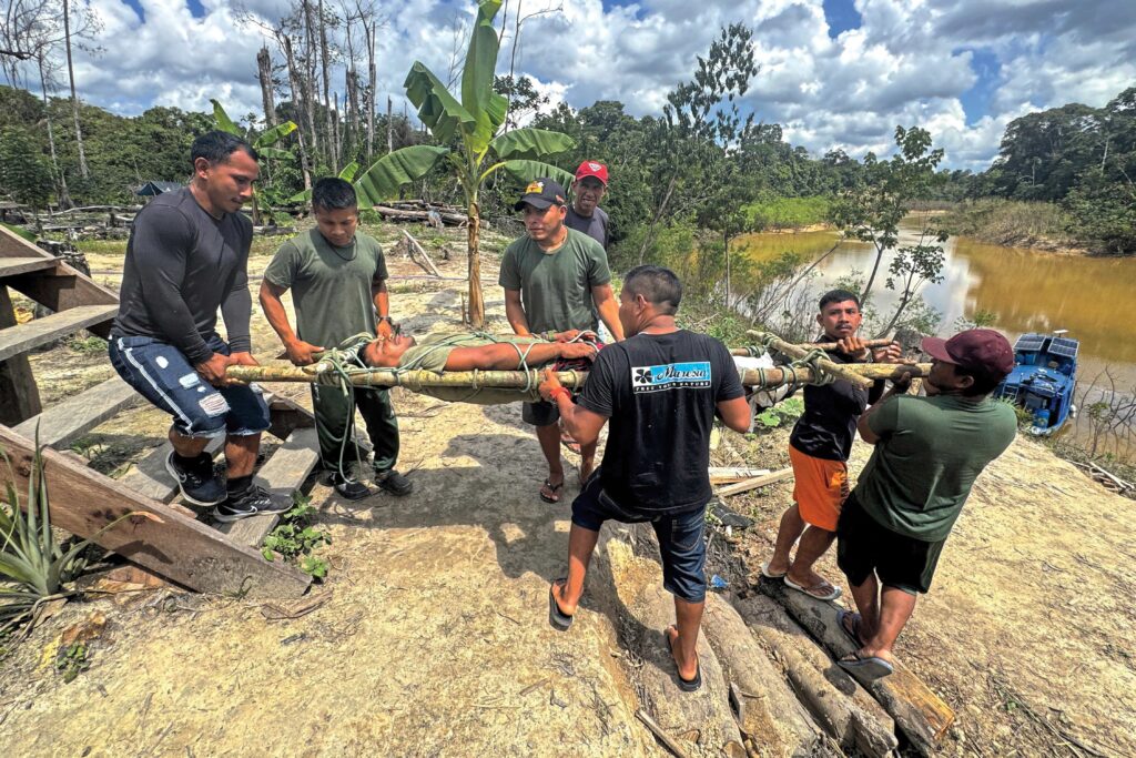 Members of the Equipe de Vigilância da Unijava (EVU) train in first aid at the organization's first-ever general meeting in July. The EVU is a new multiethnic Indigenous vigilance force that monitors intrusions into the Javari Valley reserve. Photo by Scott Wallace.