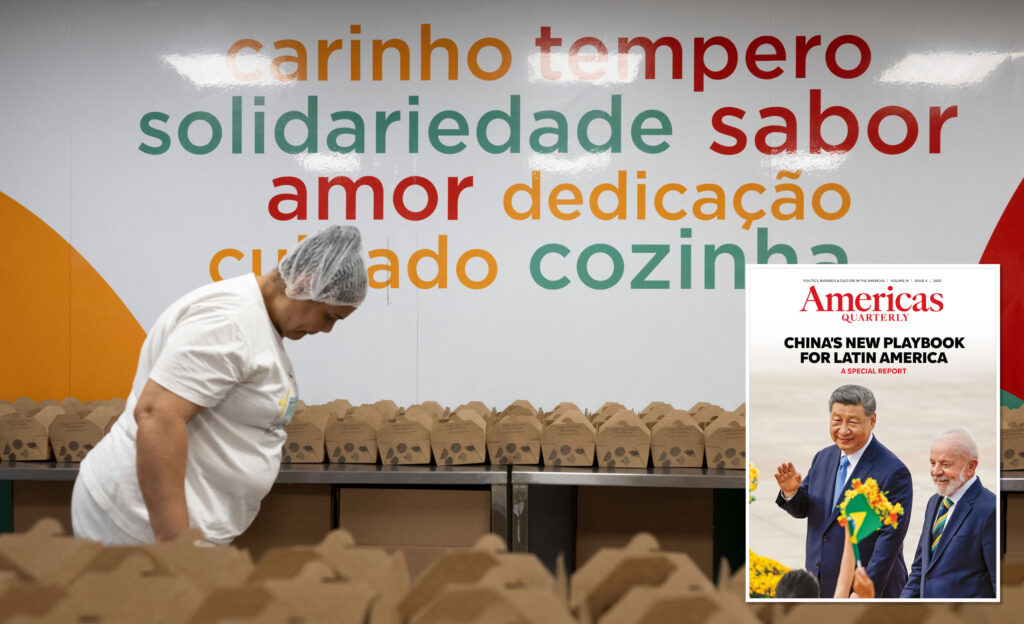 A member of Brazilian NGO Ação da Cidadania prepares food deliveries in Rio de Janeiro in 2024.