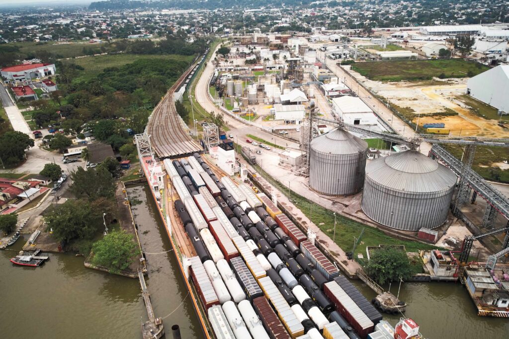 Trains are loaded onto a ship in Coatzacoalcos, Veracruz. The 180-meter ferry is operated by CG Railway (CGR) and was built to transport entire railway cars across the Gulf of Mexico and toward Mobile, Alabama.