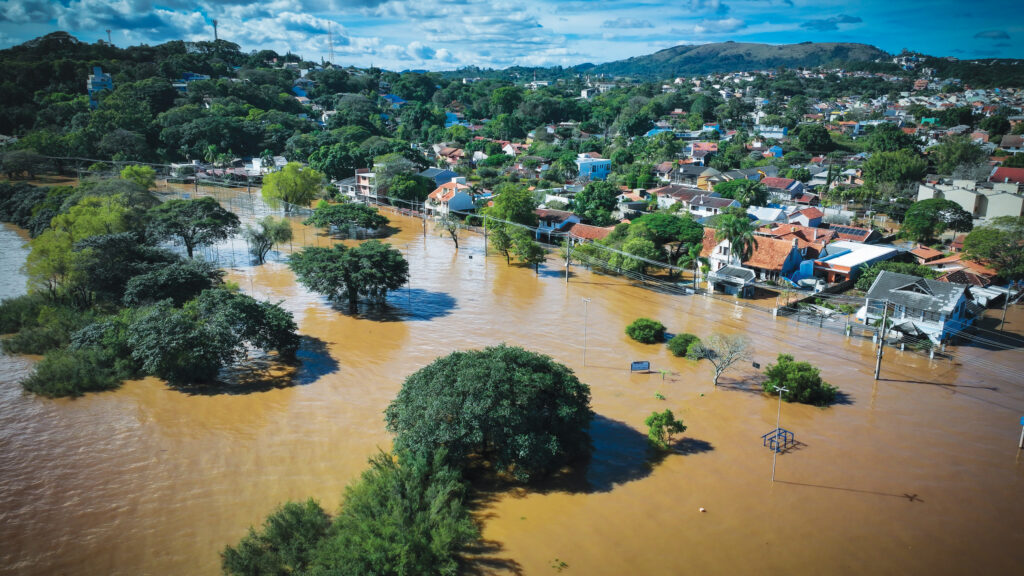 The Guarujá neighborhood of Porto Alegre, Rio Grande do Sul, is flooded in 2024 after an unprecedented climate disaster devastated the state. Torrential rains killed 184 people and displaced more than 615,000.