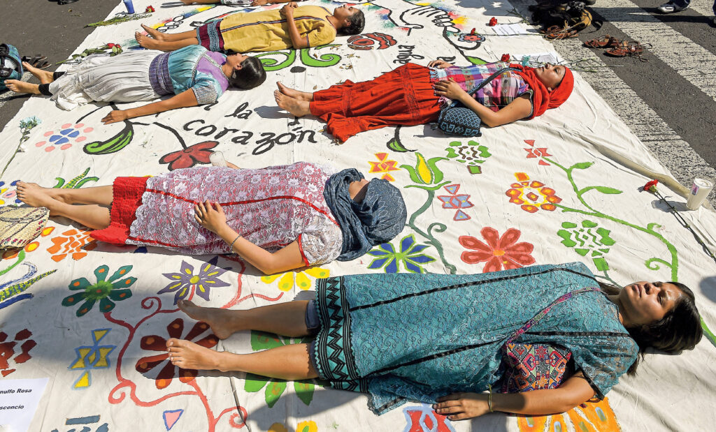 Students in Guerrero state protest in Mexico City, in 2014, to pressure authorities to solve the disappearance of 43 vanished Ayotzinapa students that same year.