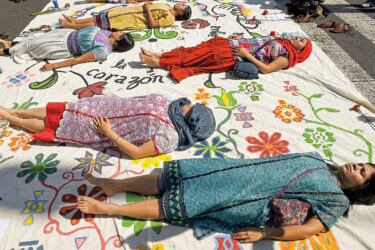 Students in Guerrero state protest in Mexico City, in 2014, to pressure authorities to solve the disappearance of 43 vanished Ayotzinapa students that same year.