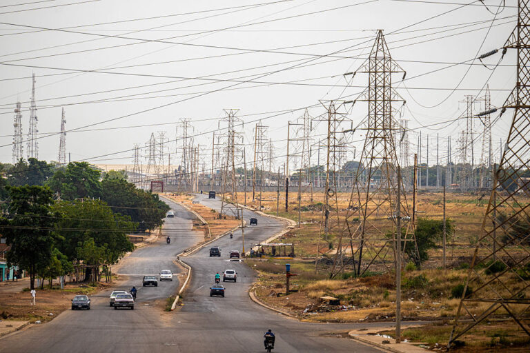 A set of electrical towers next to a road in the Western city of Maracaibo, Venezuela, in early February.  