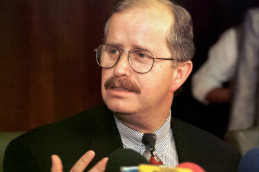 Former Ecuadorian Central Bank President Luis Jacome speaks during a press conference in 1998.
